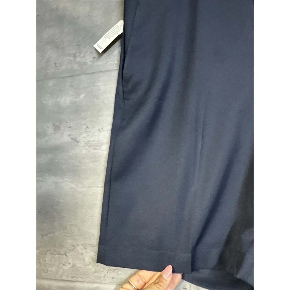 NWT Greg Norman navy blue performance golf shorts Flat Front Smooth Fabric S36